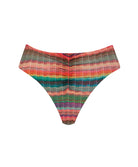 A striped bikini bottom against a white wall.