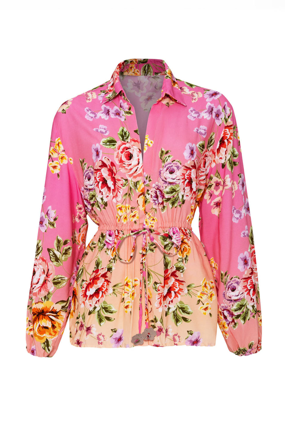 A long sleeve floral cover up against a white wall.