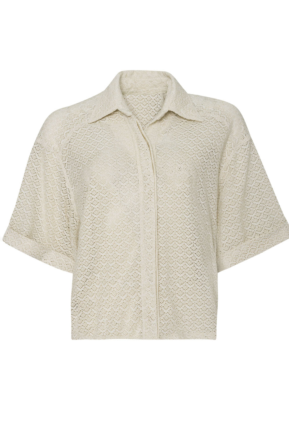 An Ivory shirt against a white wall.