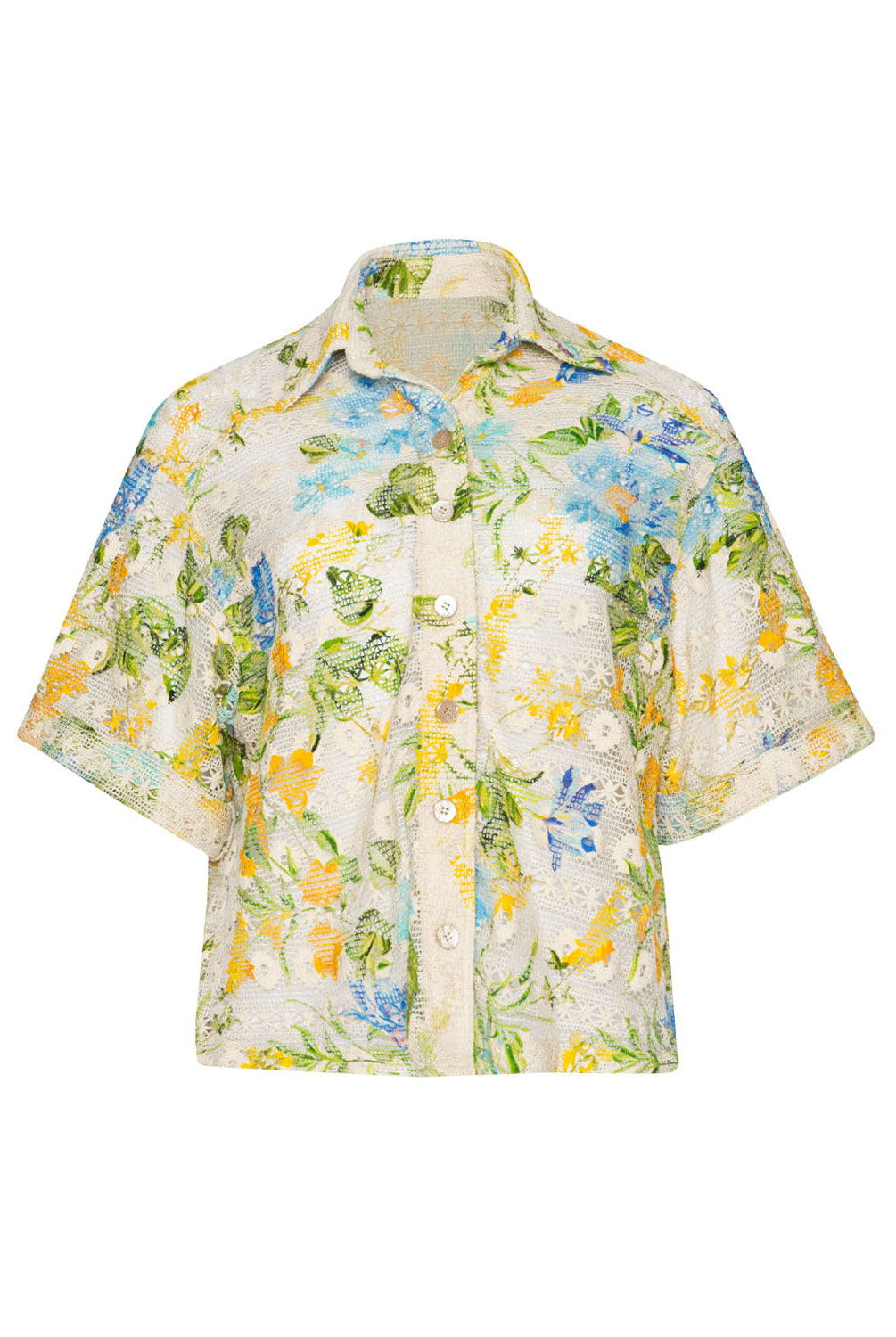 A button down shirt with a floral print against a white wall.