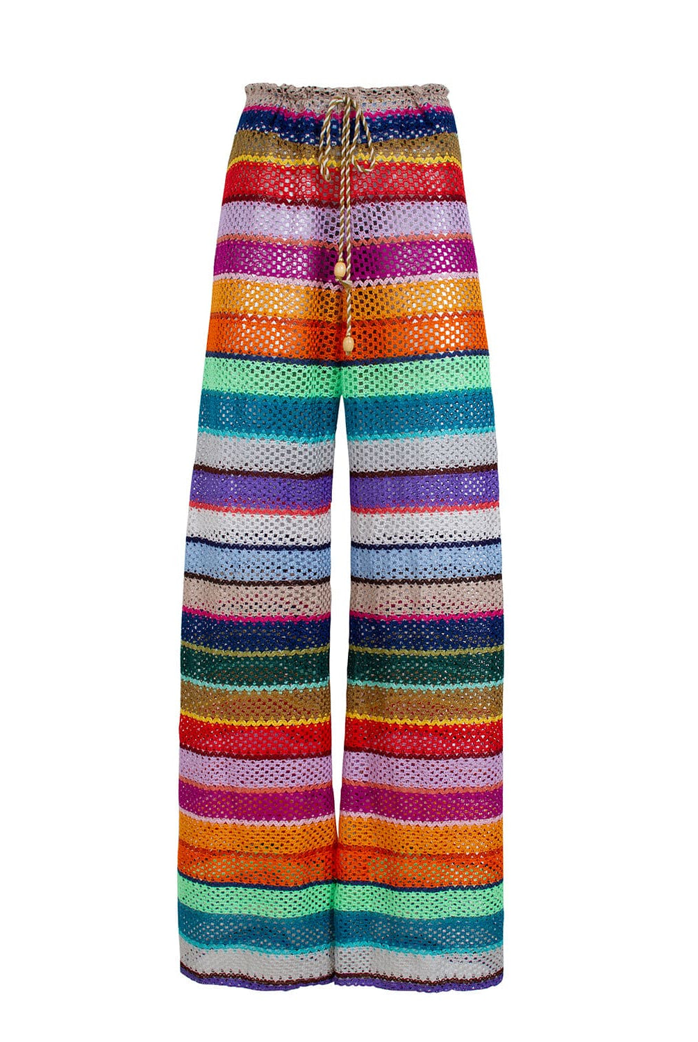 Long color block pants against a white wall.