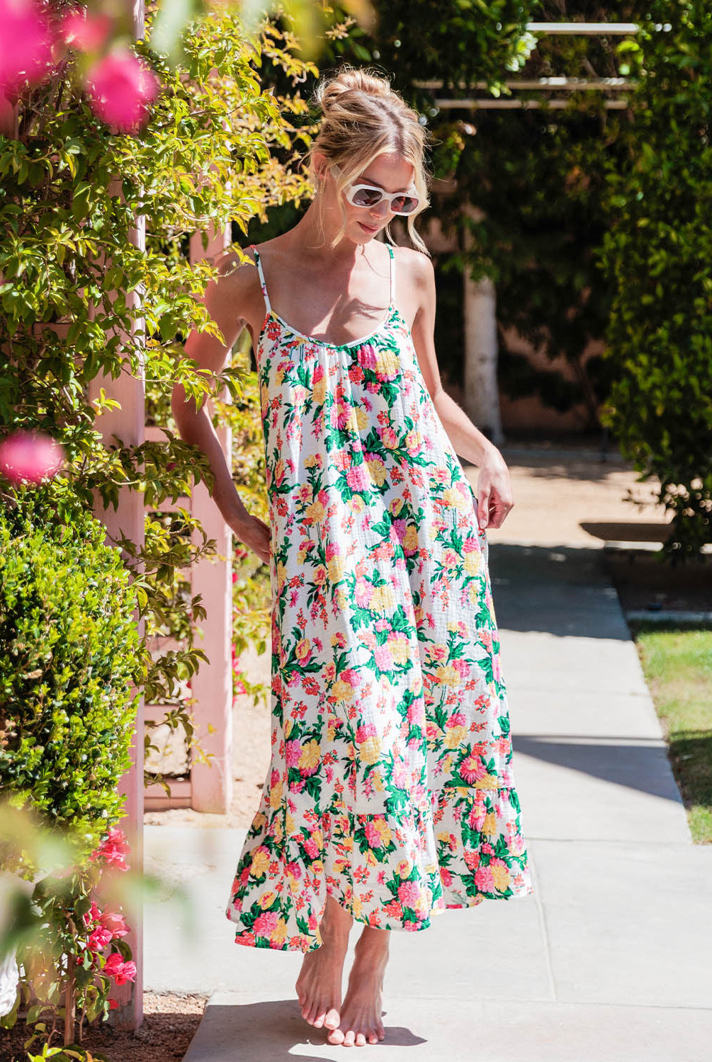 Dahlia Dress – Tropical Floral Sleep Dress in vibrant floral print, lightweight and airy with delicate straps and a softly flounced hem, styled for relaxed mornings or lounging at home.