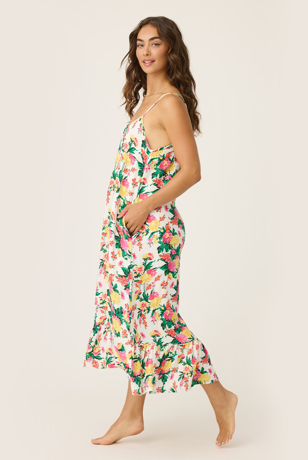 Dahlia Dress – Tropical Floral Sleep Dress in vibrant floral print, lightweight and airy with delicate straps and a softly flounced hem, styled for relaxed mornings or lounging at home.