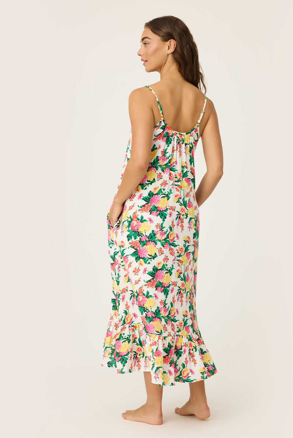Dahlia Dress – Tropical Floral Sleep Dress in vibrant floral print, lightweight and airy with delicate straps and a softly flounced hem, styled for relaxed mornings or lounging at home.
