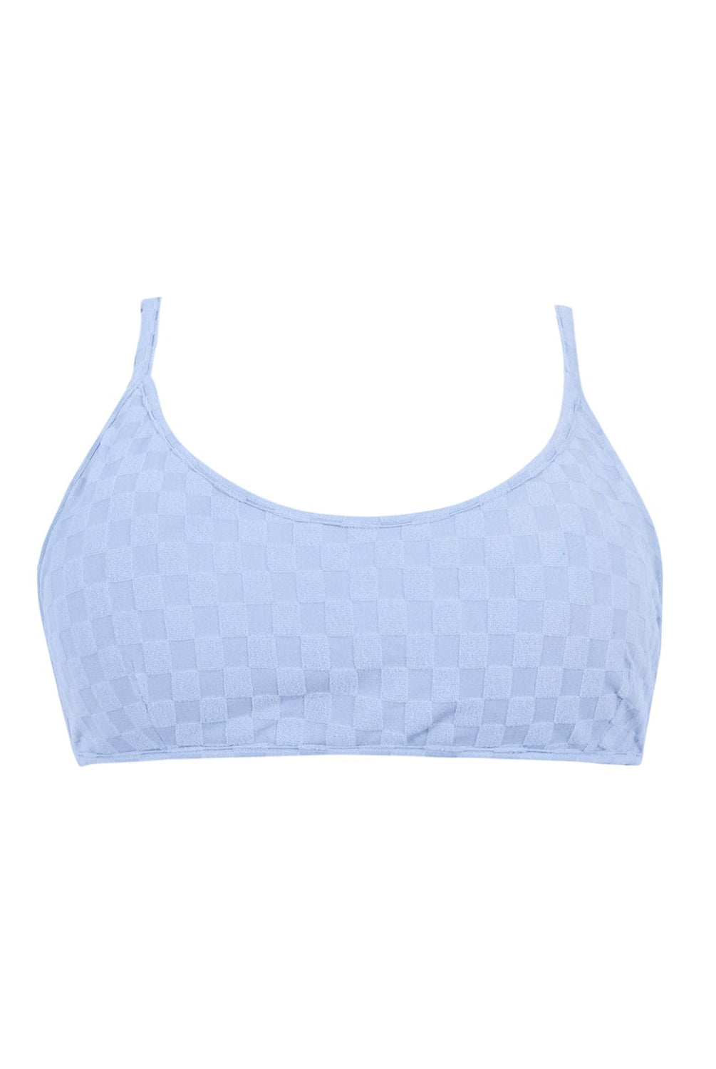 A blue bikini top against a white wall.