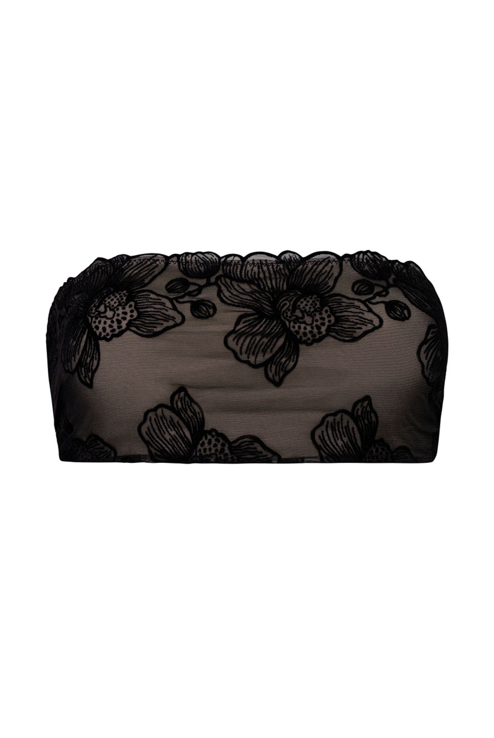 A black bandeau swim suit top against a white wall.