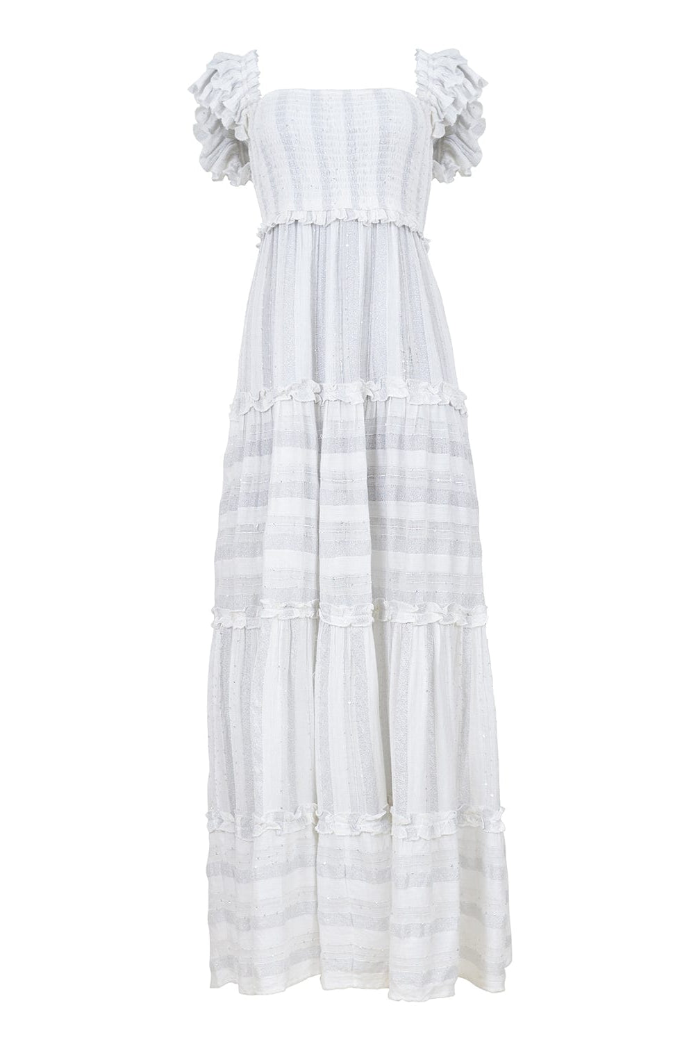 A long white dress against a white wall.