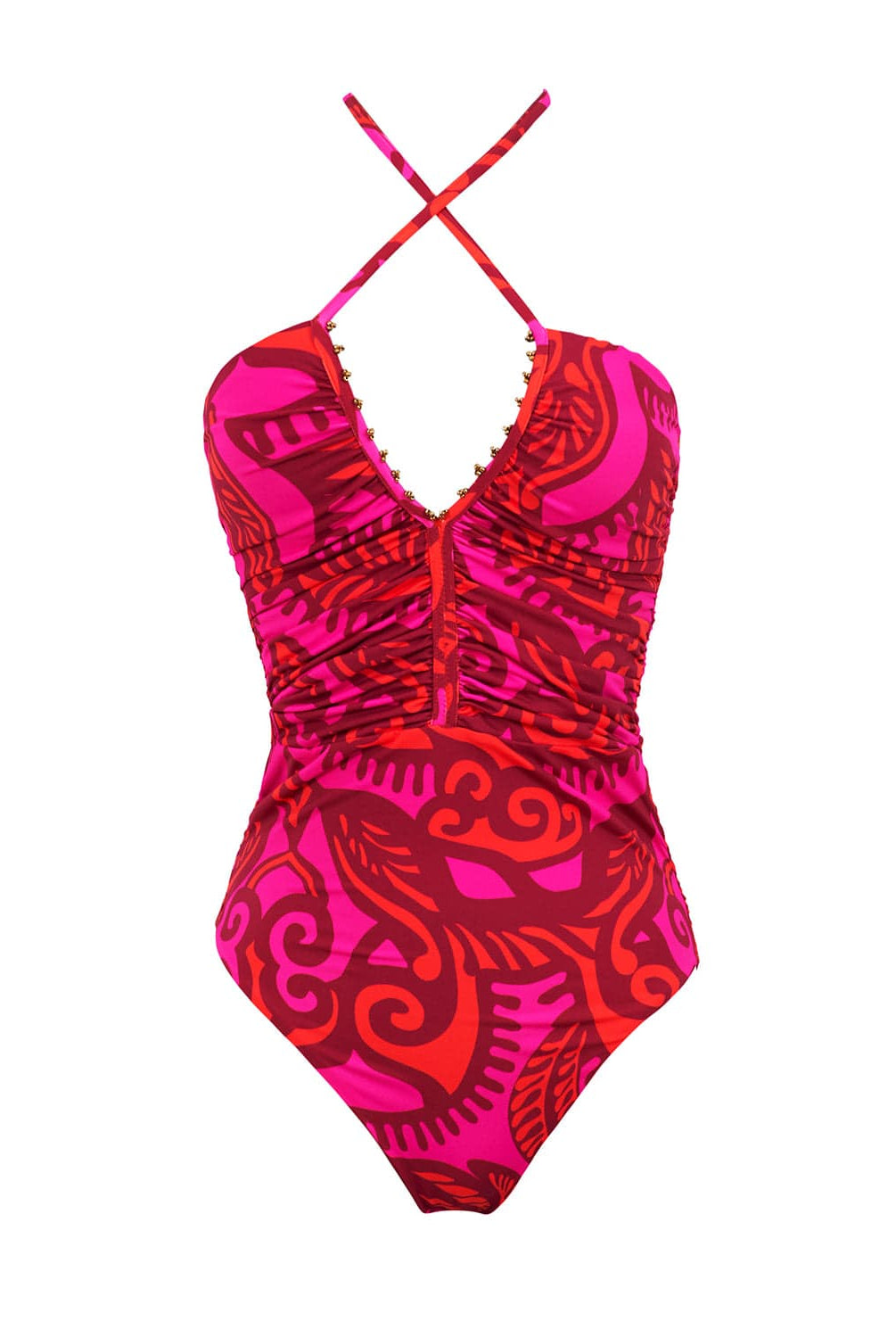 A pink & red one piece swim suit against a white wall.