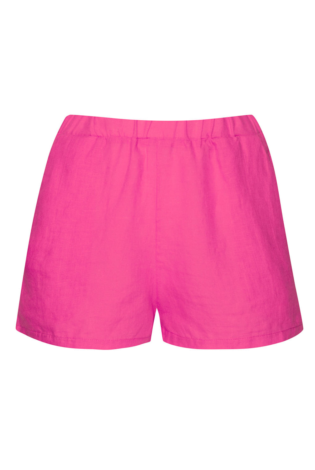 Hot pink linen shorts against a white wall.