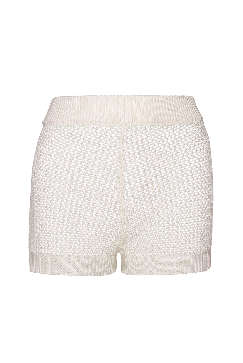 Ivory knit shorts against a white wall.