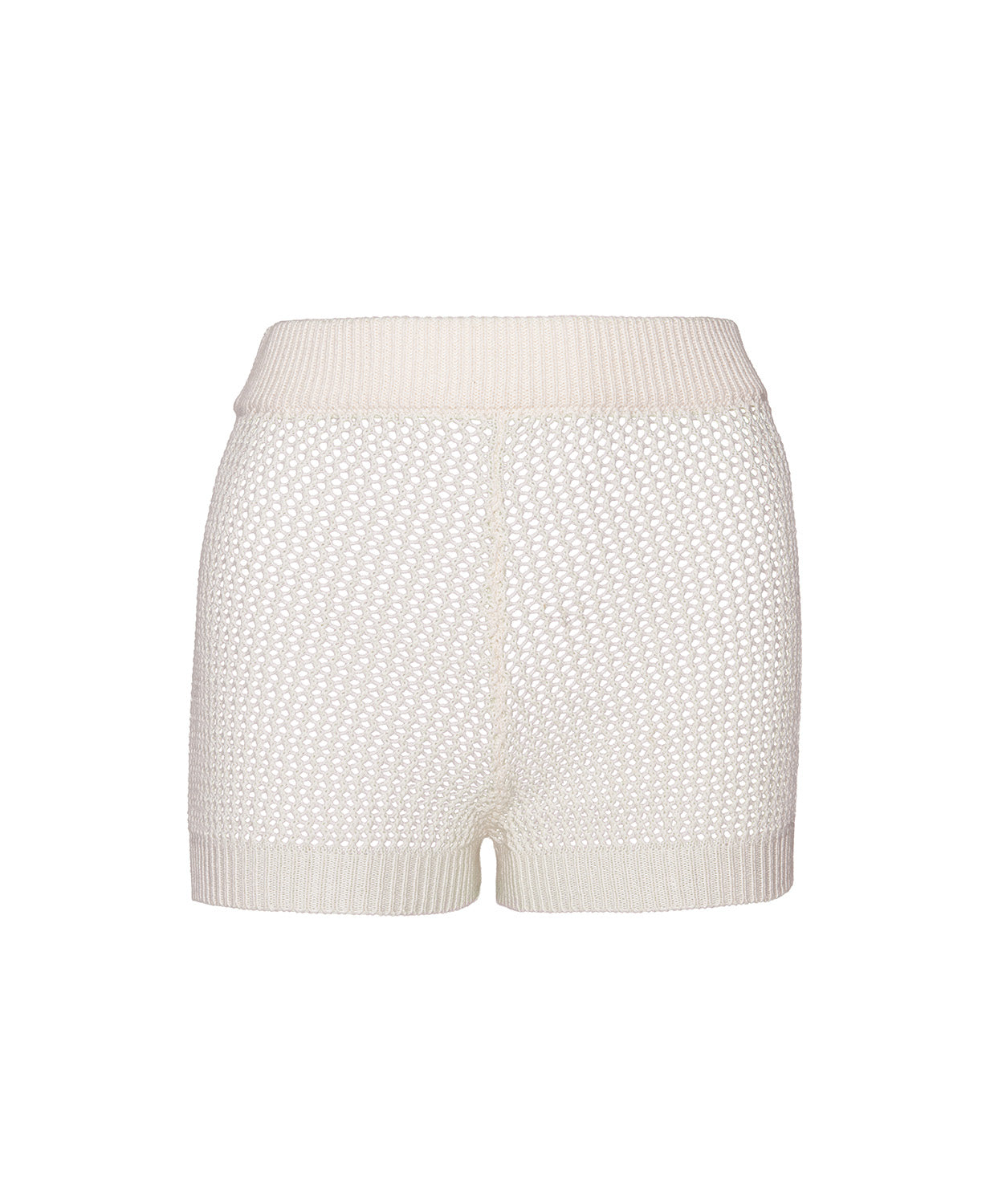 Ivory knit shorts against a white wall.