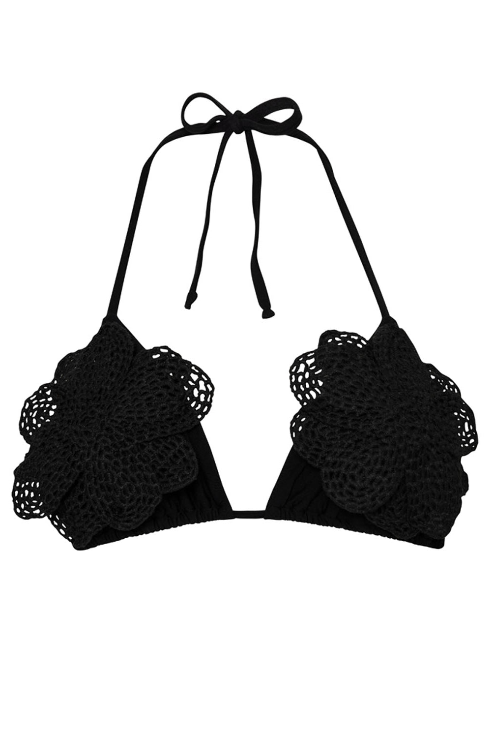 A black bikini triangle top against a white wall background.