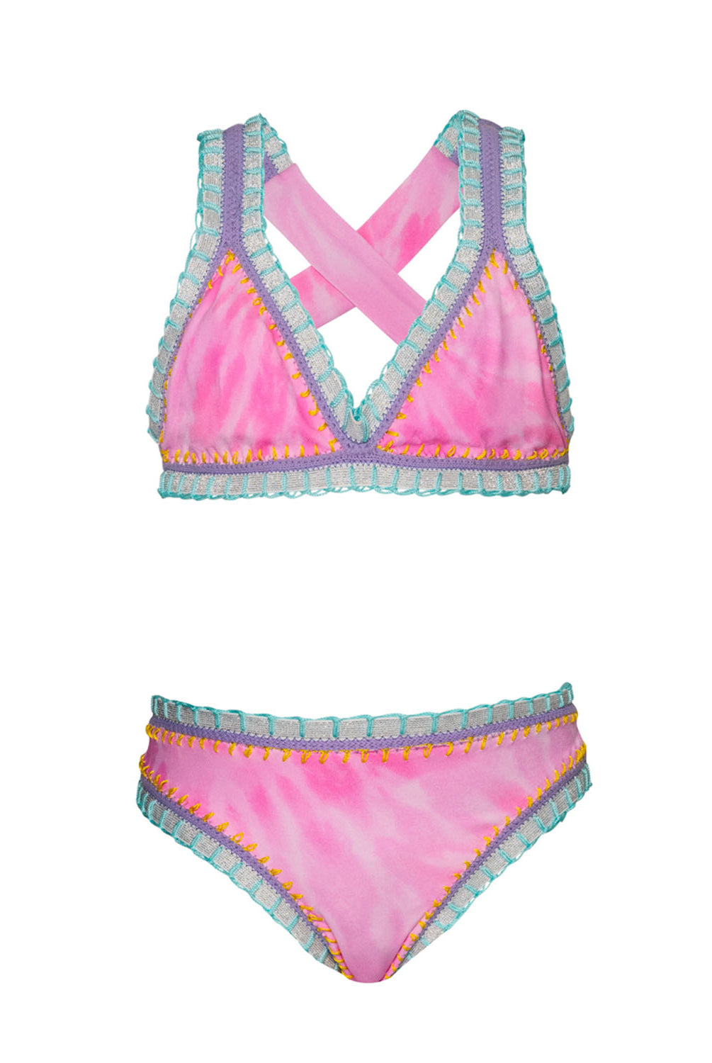 A pink embroidered bikini against a white wall.