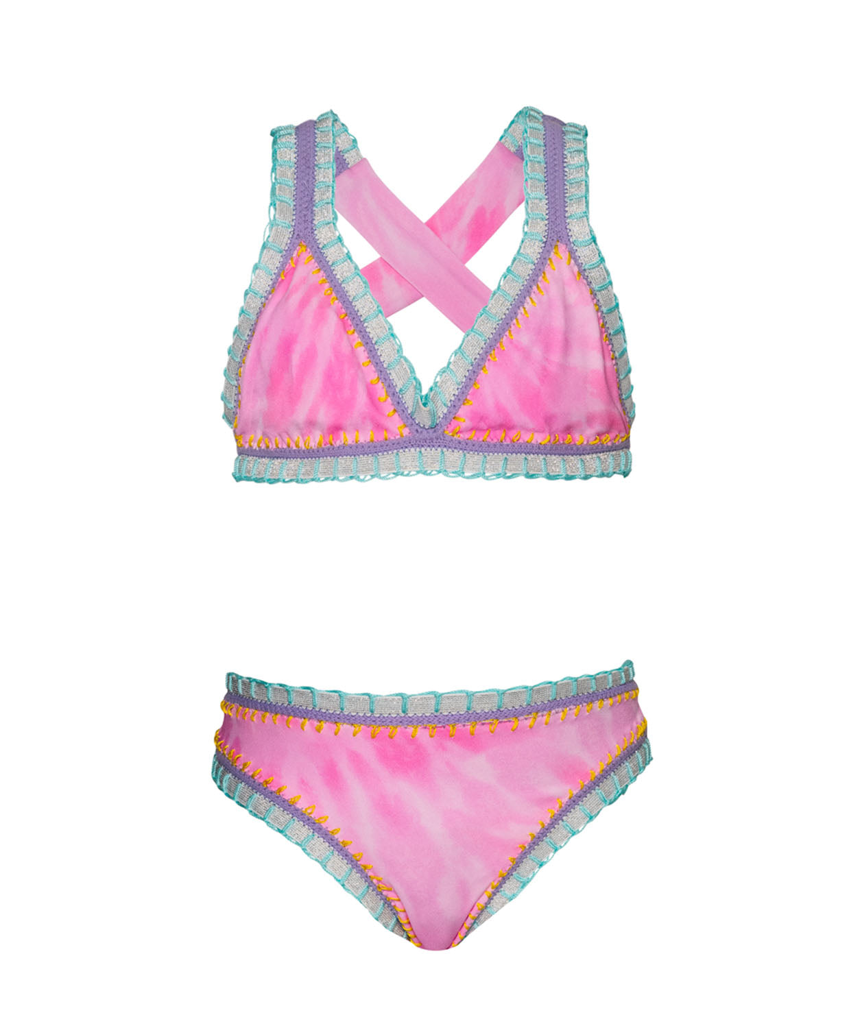 A pink embroidered bikini against a white wall.