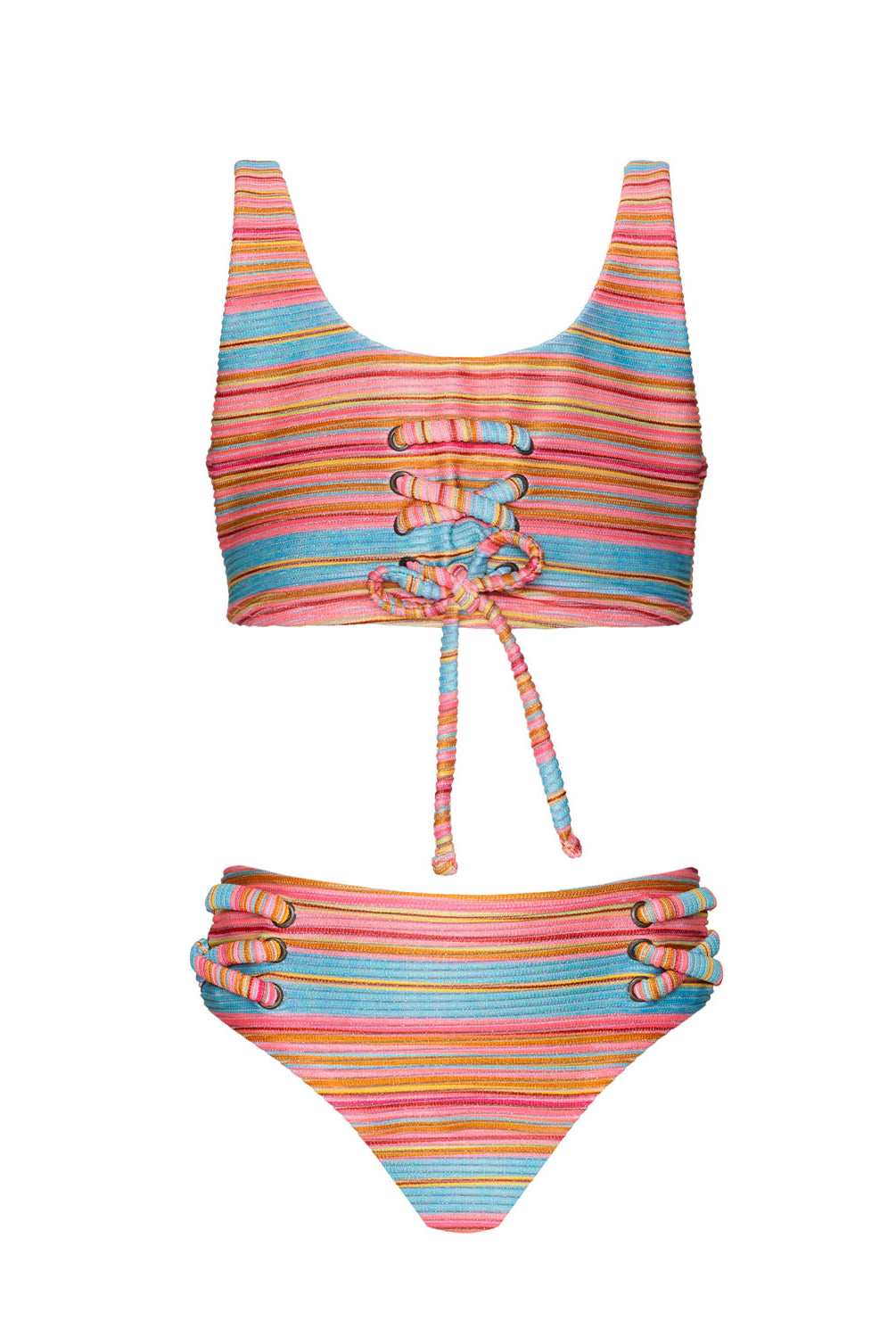 A colorful striped kids bikini against a white wall.