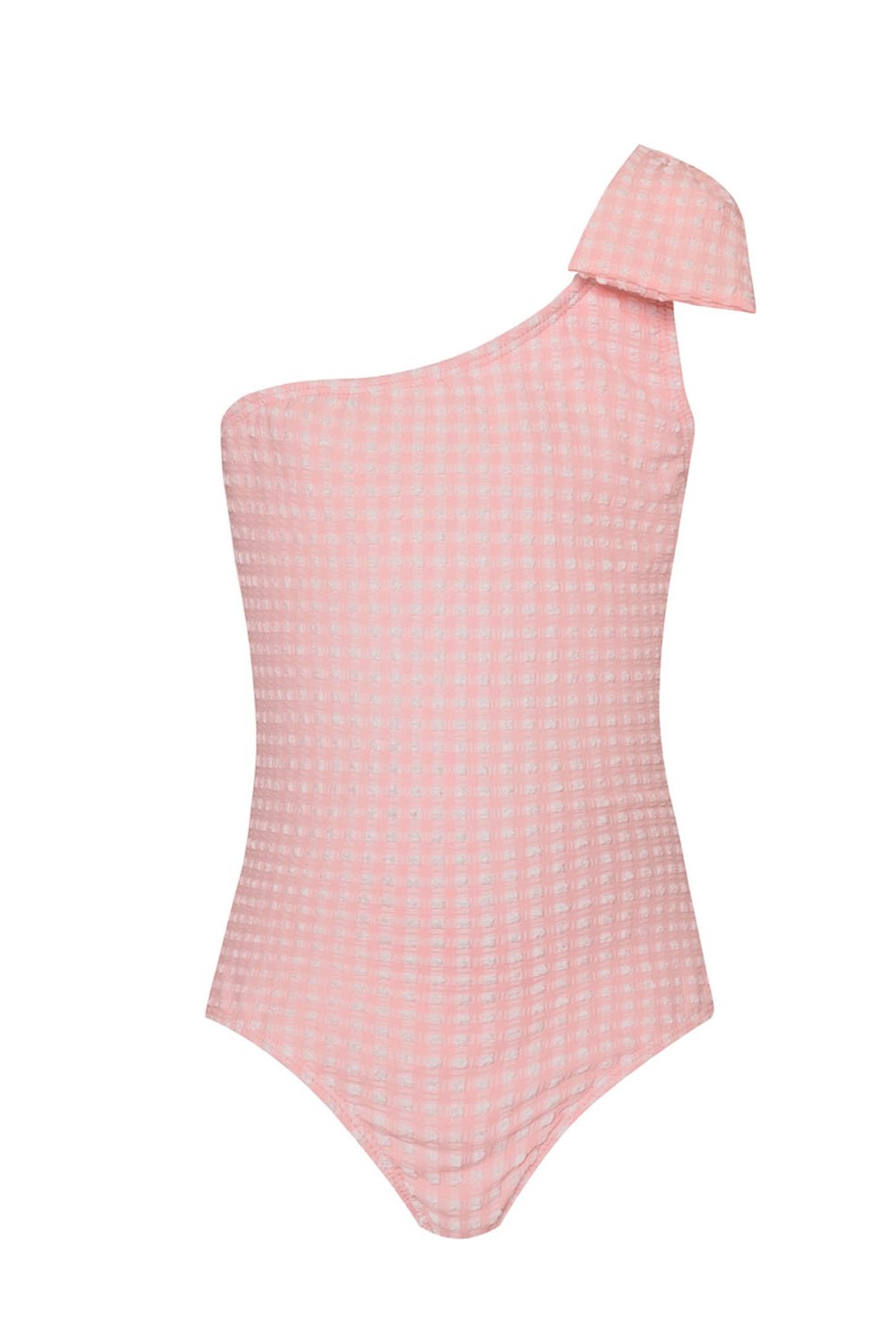 A light pink one piece with a bow against a white wall.