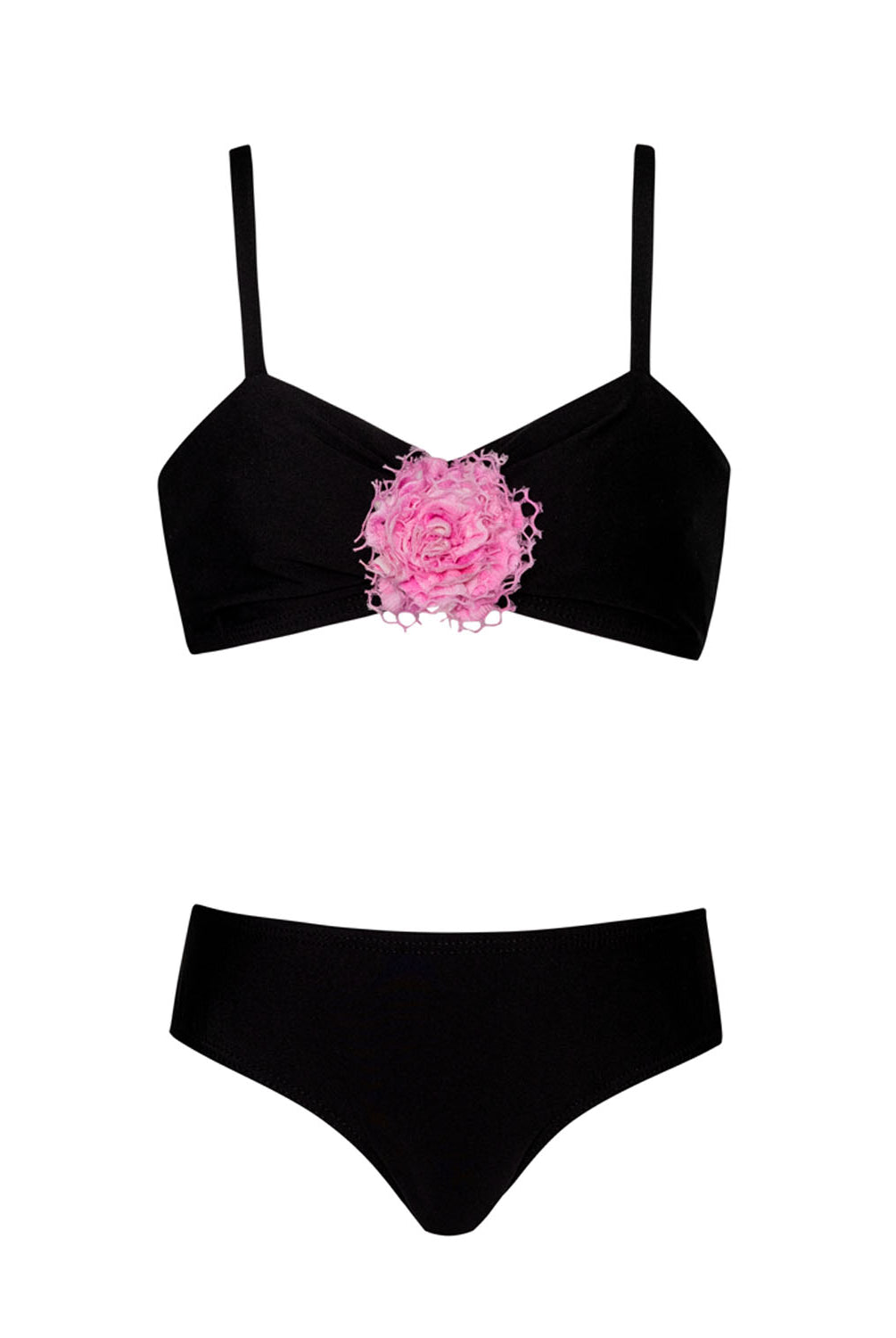A black bikini with a pink rose on the top against  white wall.
