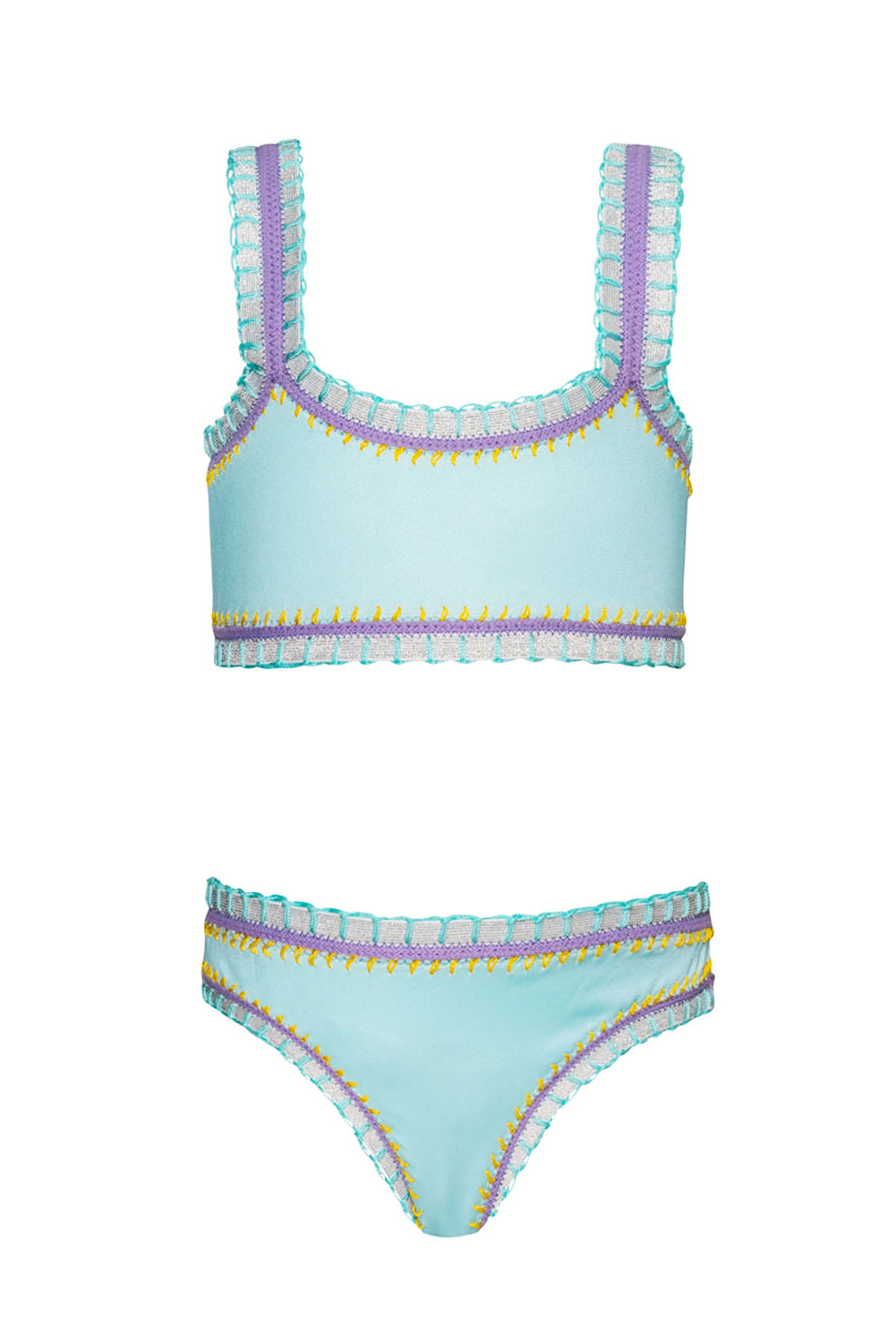 A light blue kids bikini with colorful embroidery against a white wall.