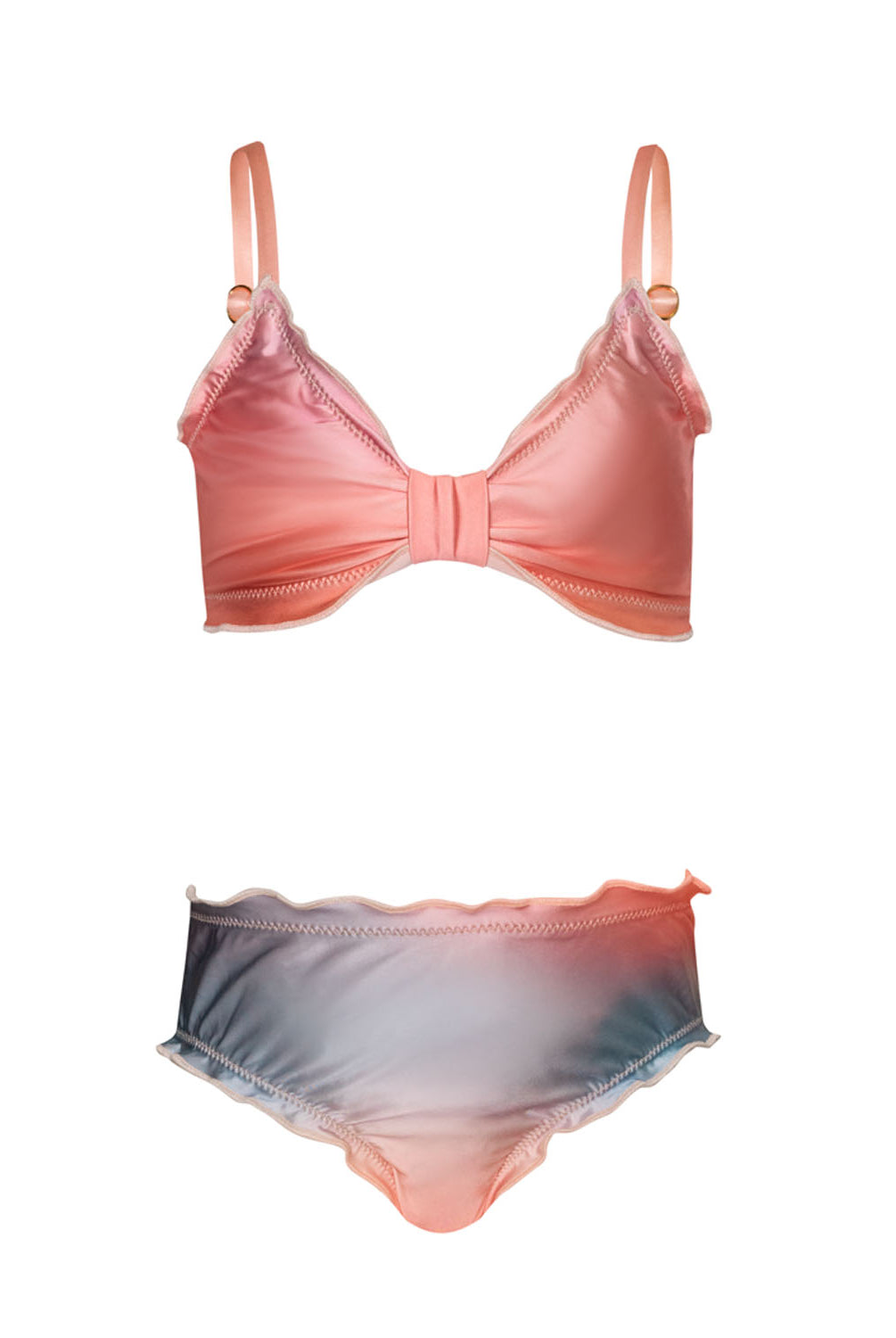 A colorful kids bikini against a white wall.