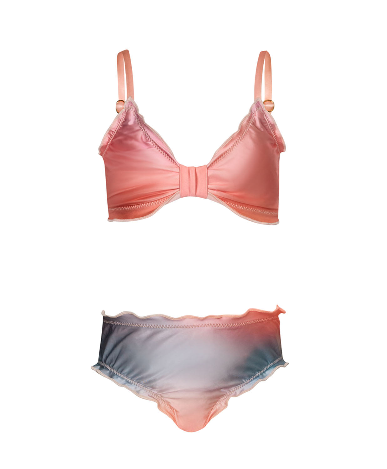 A colorful kids bikini against a white wall.