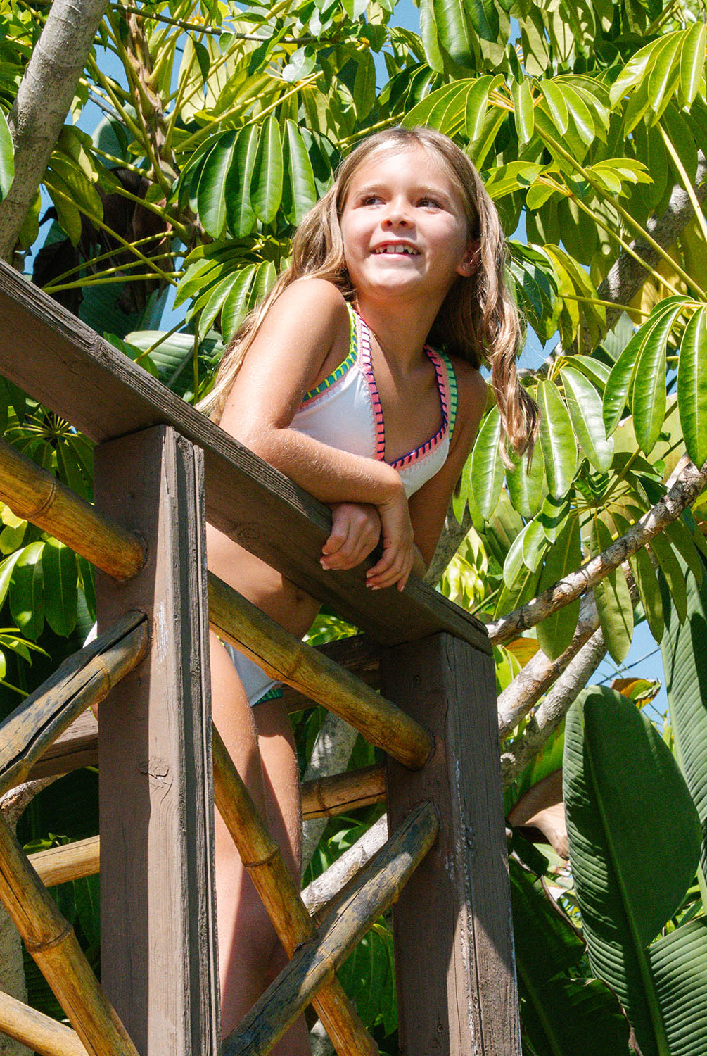 Kids Water Lily Rainbow Embroidered Bikini in vibrant colors with signature elastic accents.