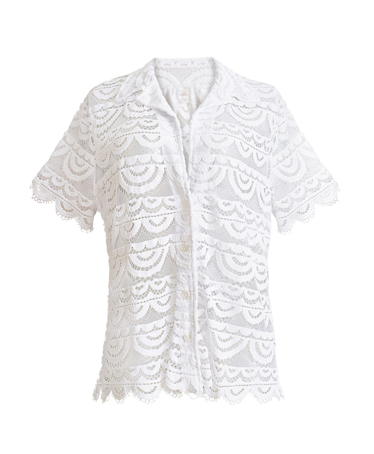 A white lace button down shirt against a white wall.