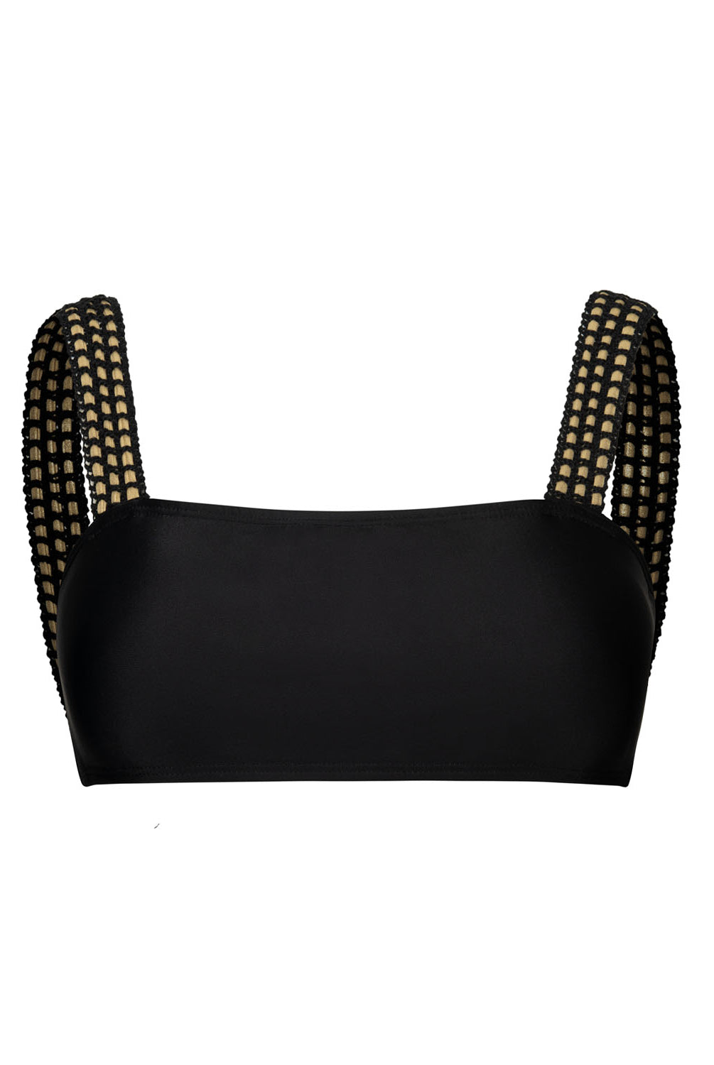 A black bikini top with gold details against a white wall.