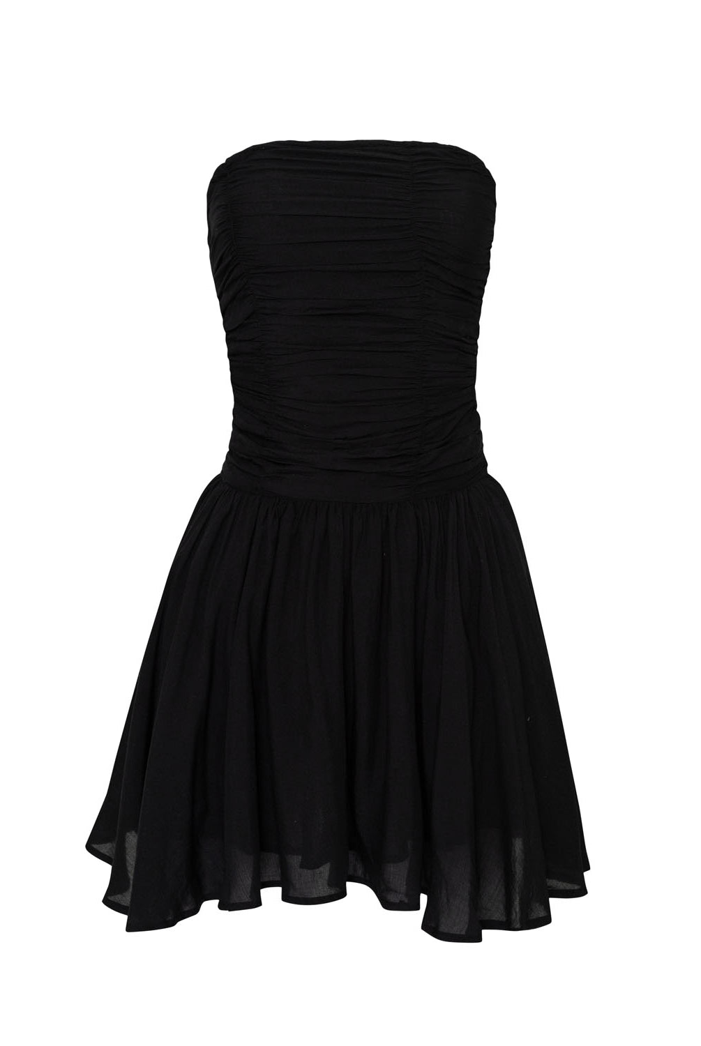 A black strapless mini dress against a white wall.