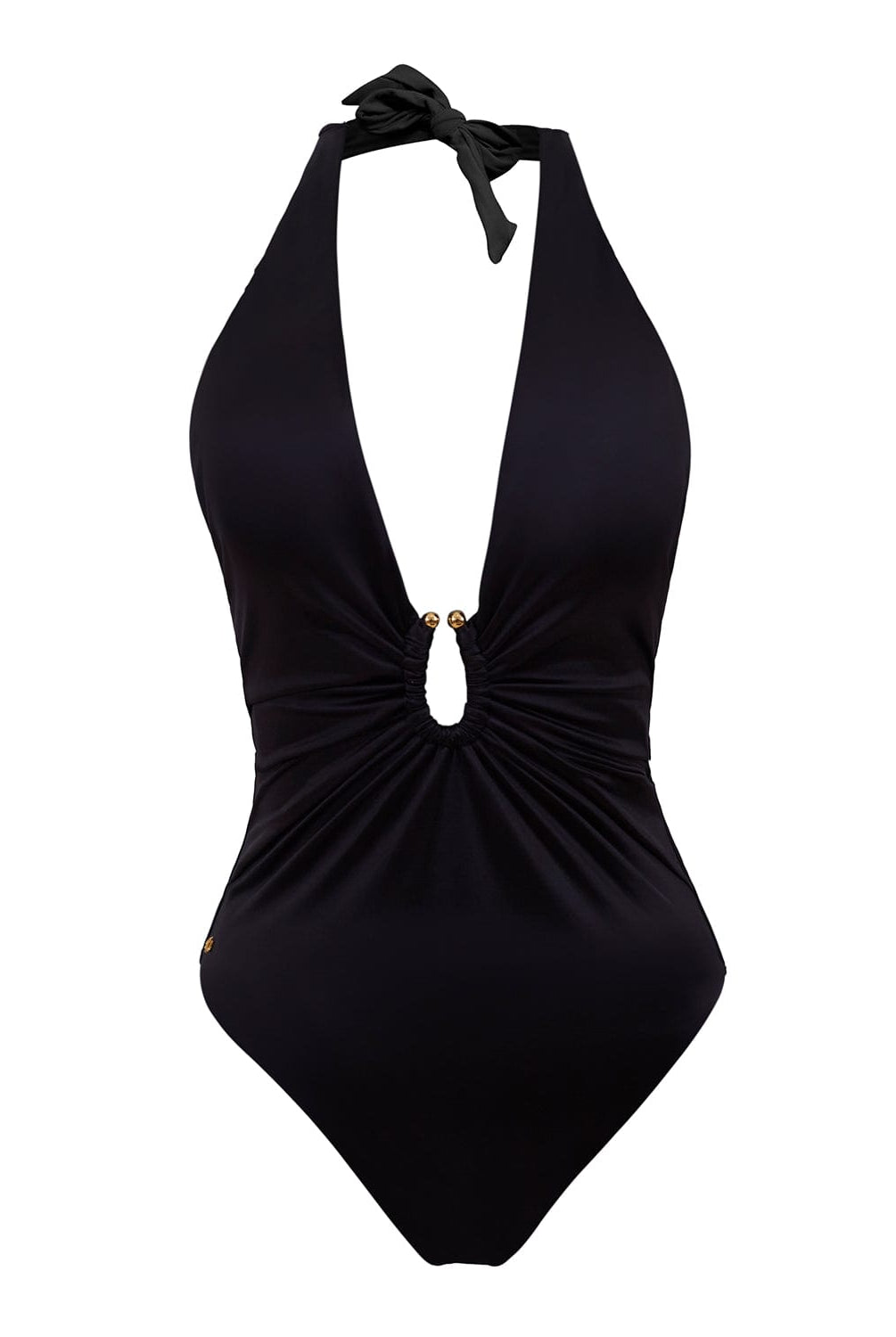 A black one piece swimsuit against a white wall. 