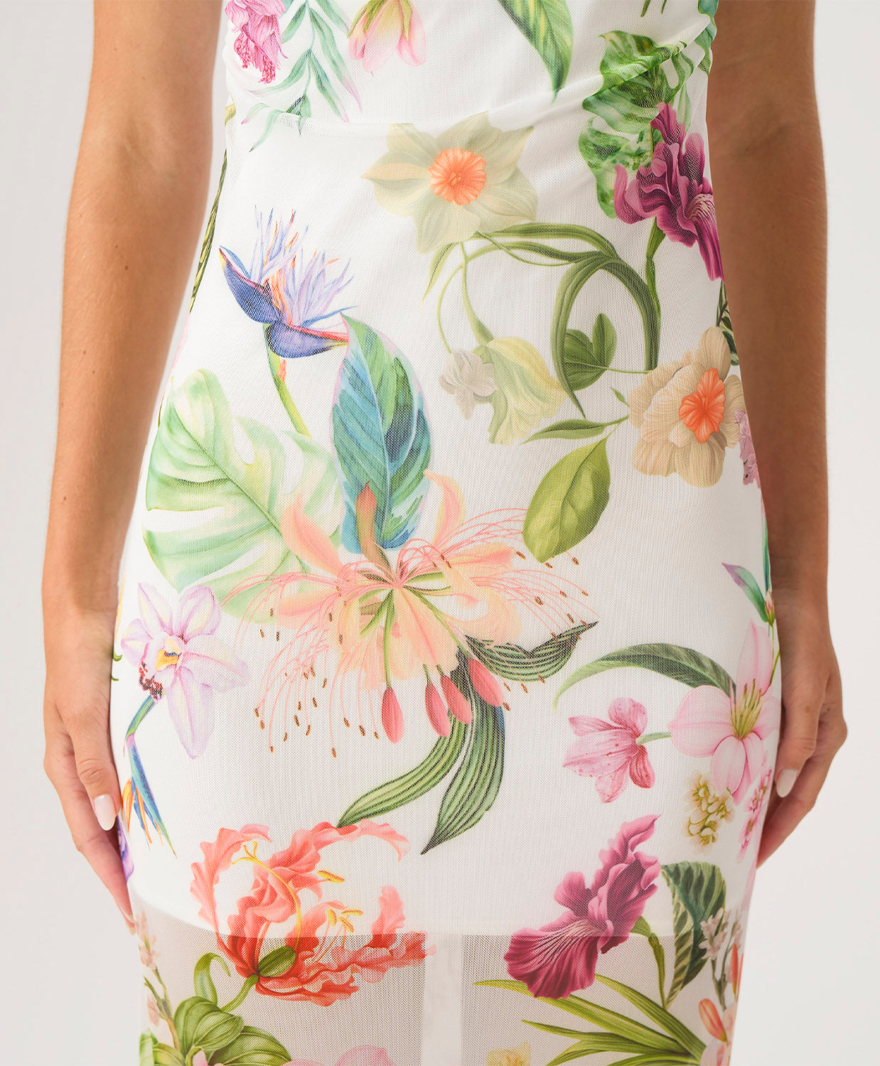 Floral dress with colorful flowers and leaves on a white background