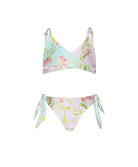 Kids Petal Gianna Bikini – light blue floral two-piece with crisscross top and oversized tie bottoms, perfect for sunny beach days.