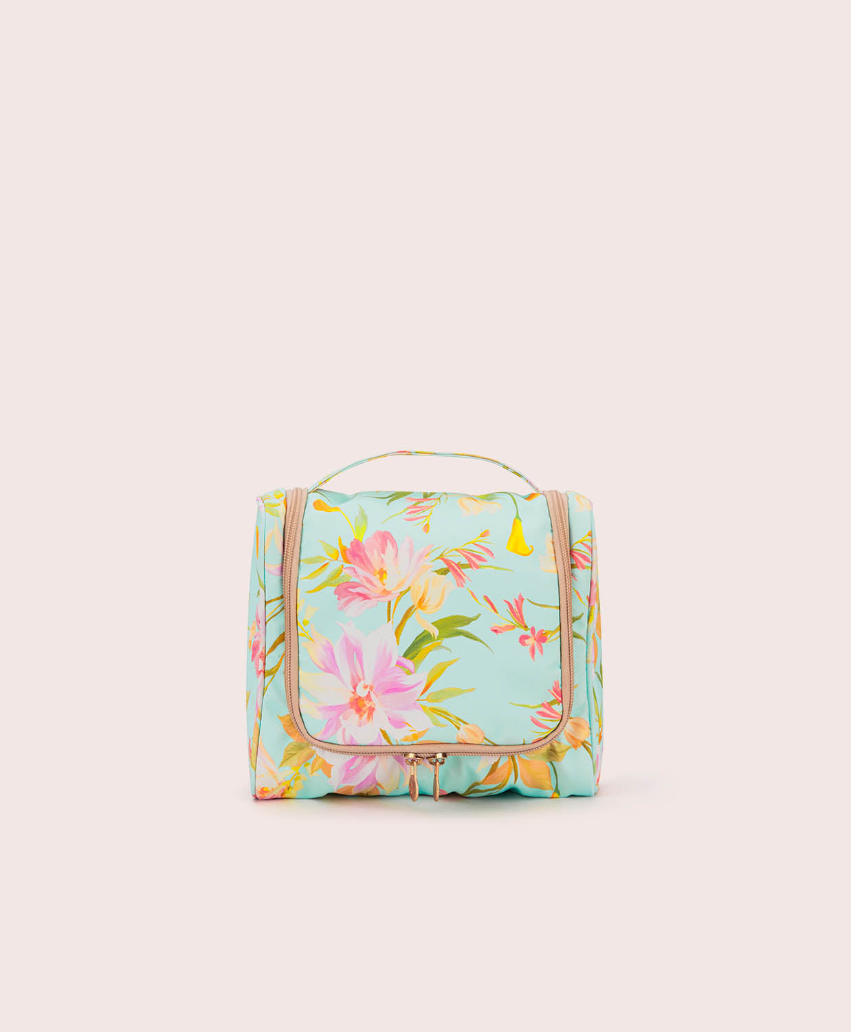 Floral-patterned toiletry bag on a light beige background