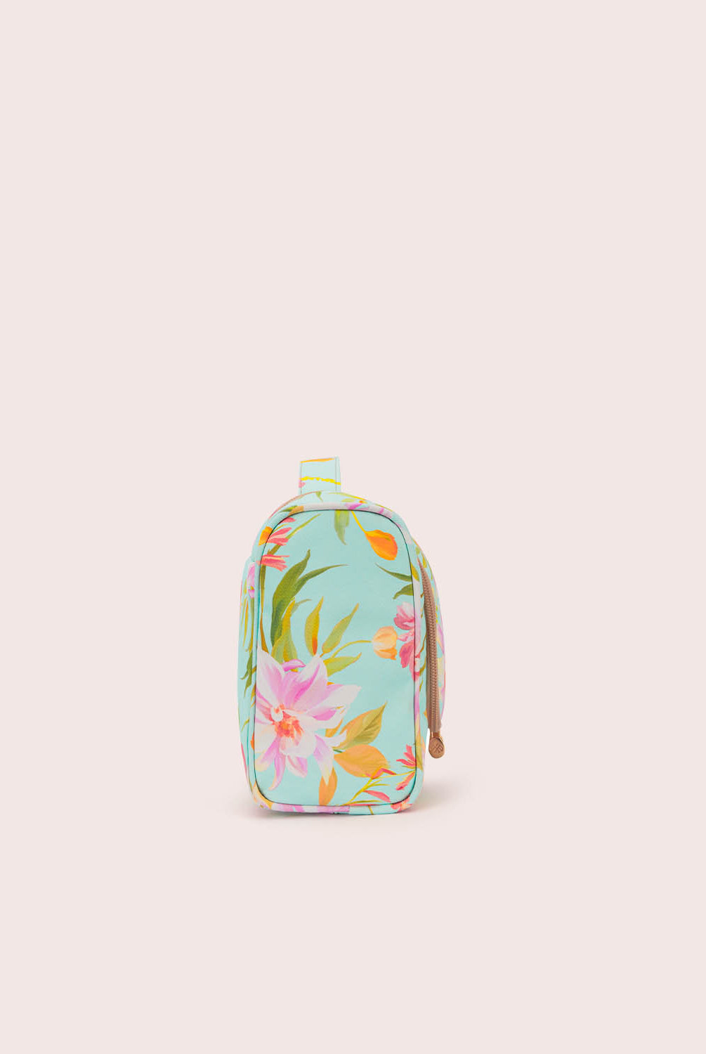Floral-patterned toiletry bag on a light beige background