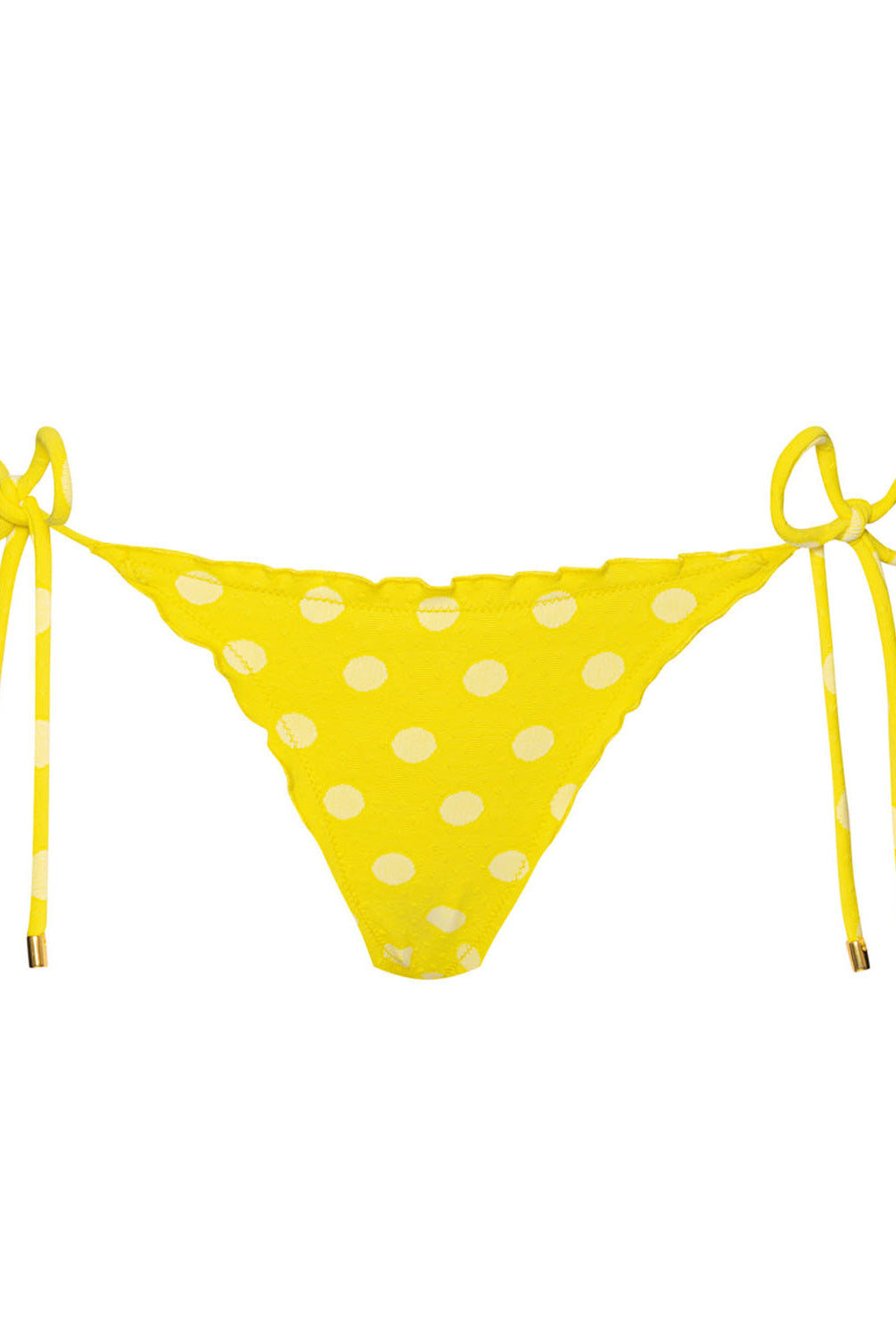 A yellow polka dot bikini against a white wall.