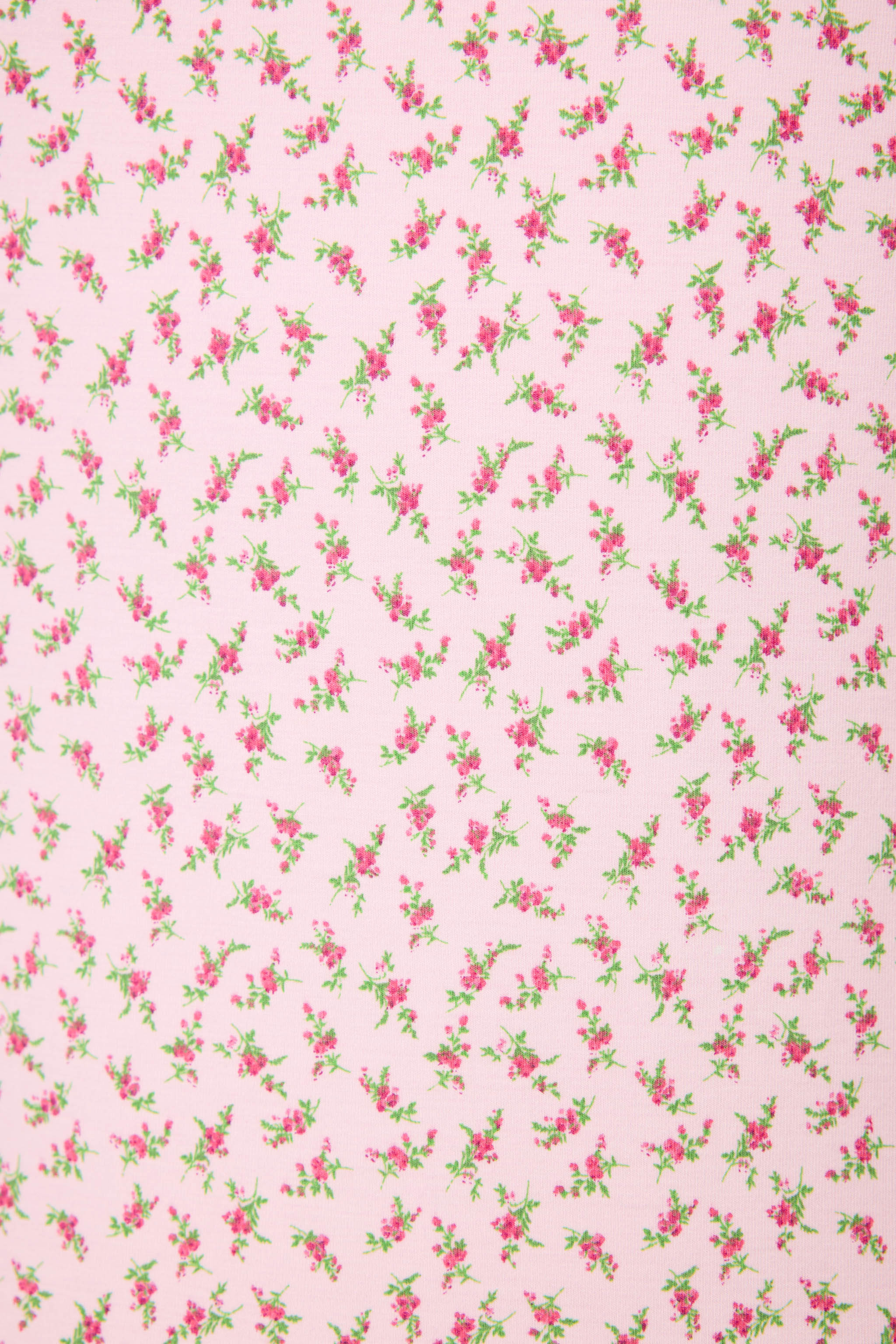 Ditsy Floral Midi Dress featuring pink dainty florals with leopard-print trim, a scoop neckline, and a side slit on a soft, midi-length tank silhouette.