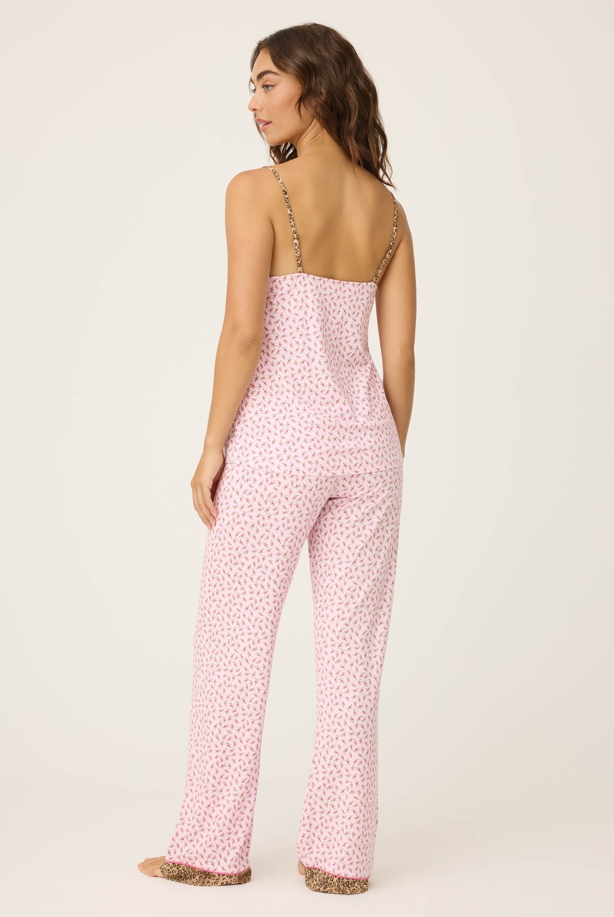 Ditsy Floral PJ Set featuring a silky cami top and wide-leg pants with pink florals and leopard-print trim.