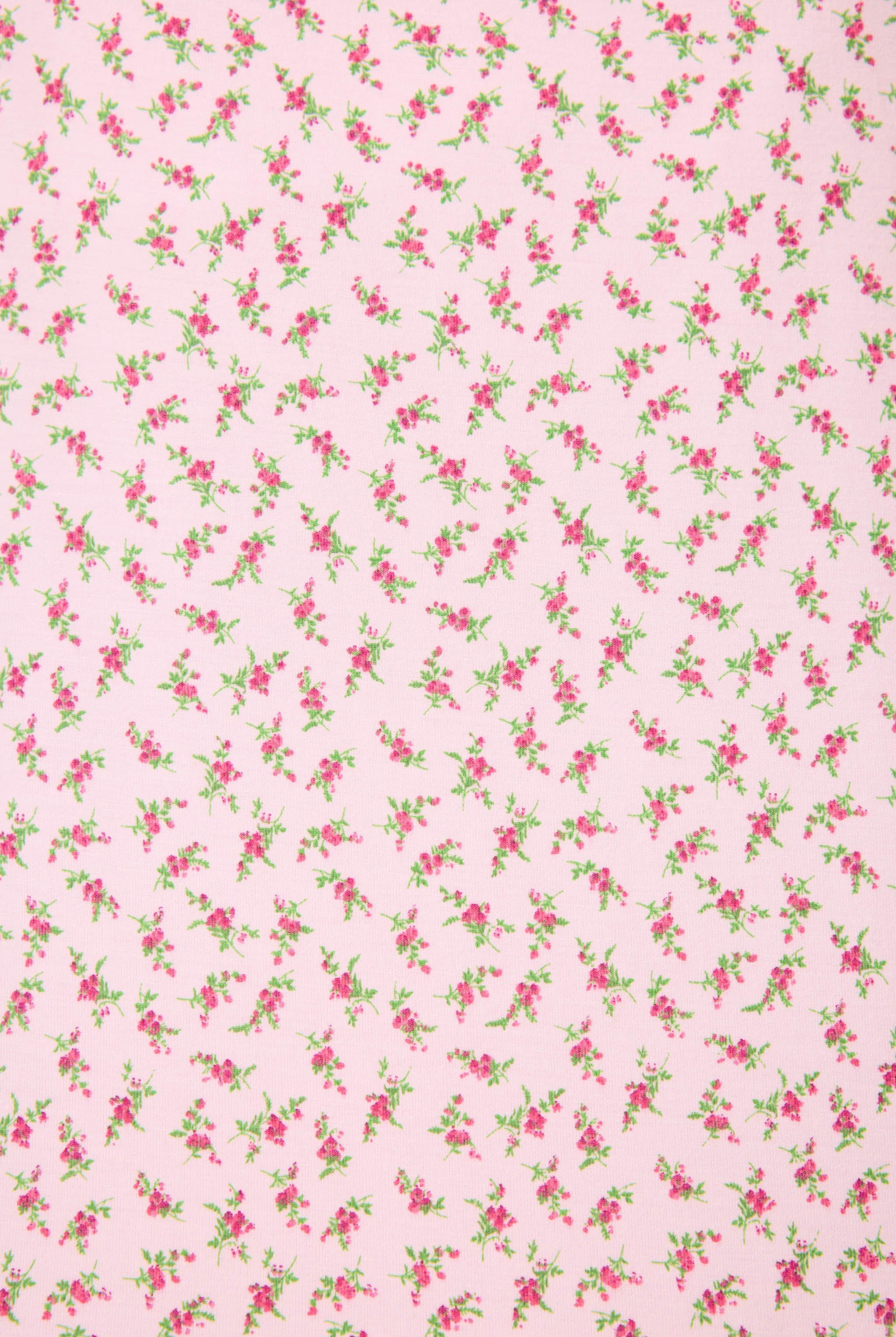 Ditsy Floral PJ Set featuring a silky cami top and wide-leg pants with pink florals and leopard-print trim.