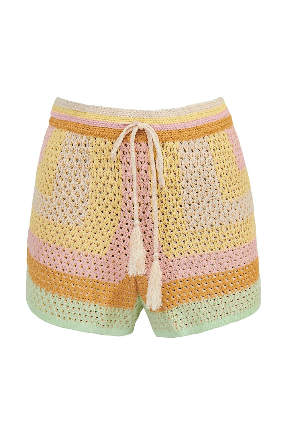 Crochet shorts with a drawstring against a white wall. 