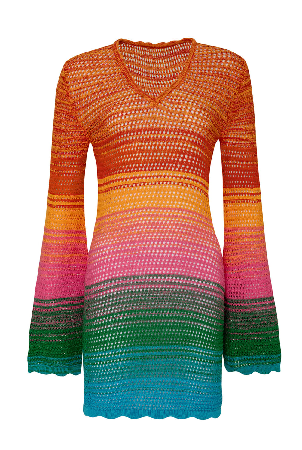 A long sleeve, knit, multi-colored dress against a white wall.