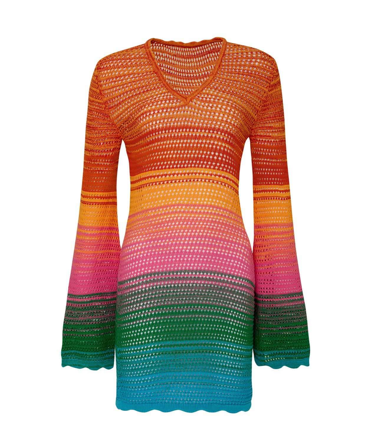 A long sleeve, knit, multi-colored dress against a white wall.