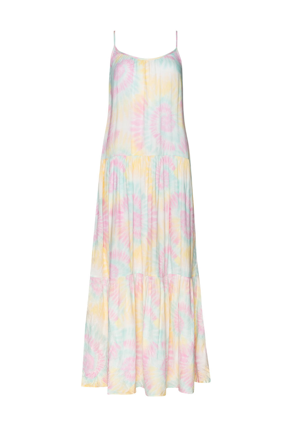 A tie-dye long dress against a white wall.