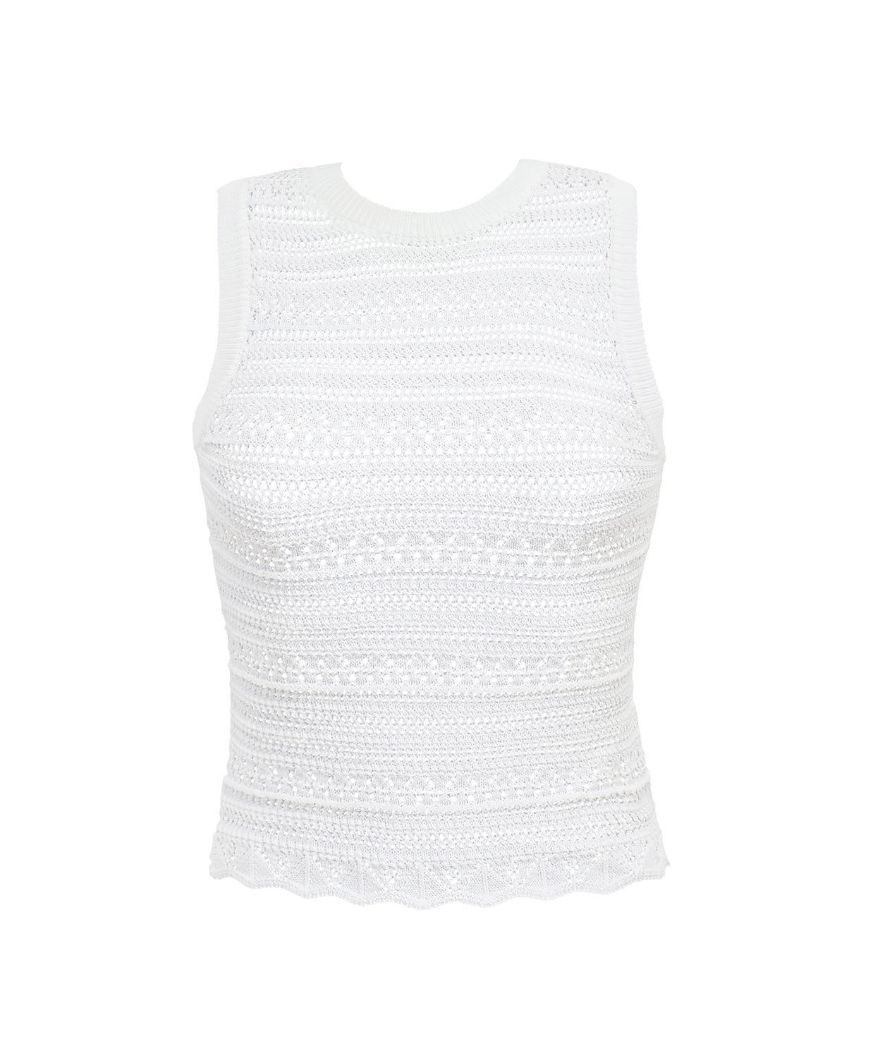 A white crochet top against a white wall. 