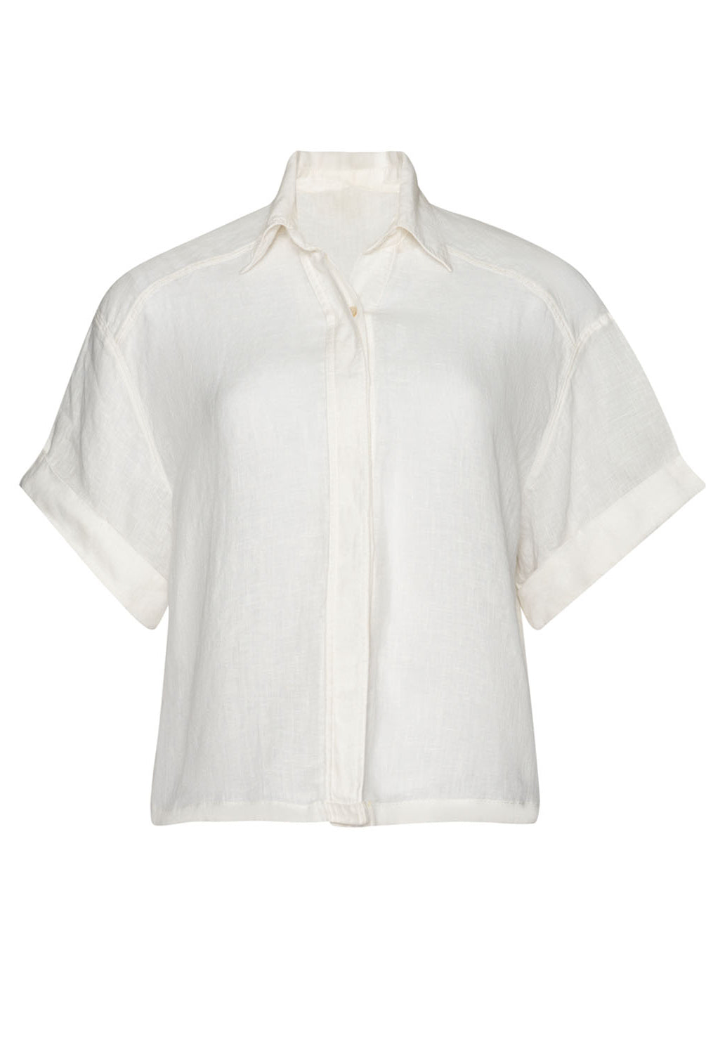 A white linen shirt against a white wall.