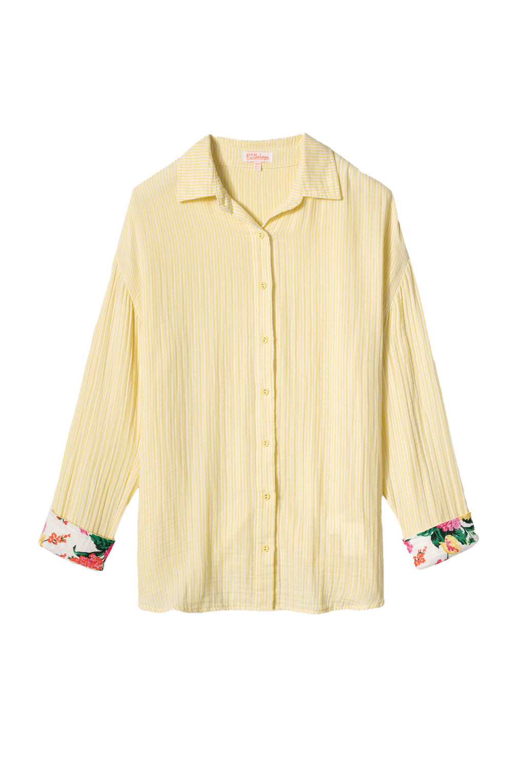 Yellow Gauze Long Sleeve with subtle yellow and white stripes, rolled-up sleeves revealing tropical floral print, button-up front and crisp collar.