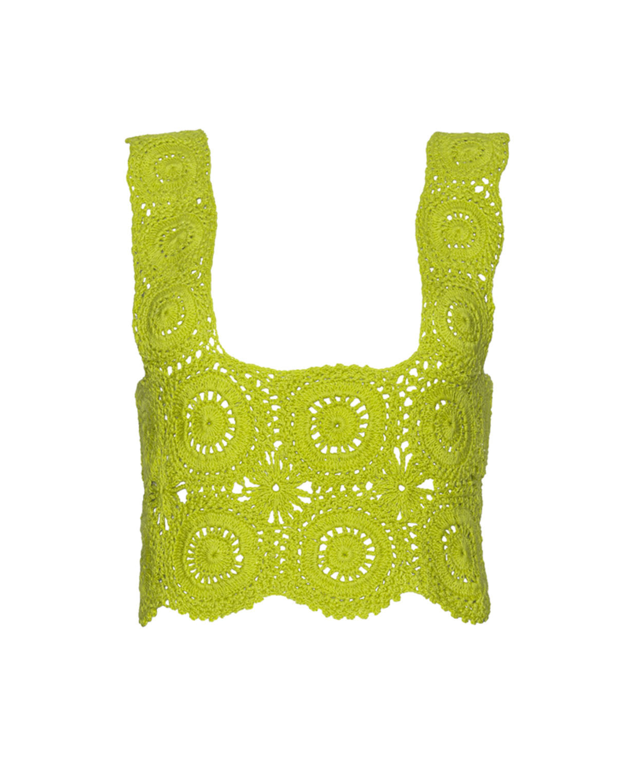A green crochet top against a white wall.