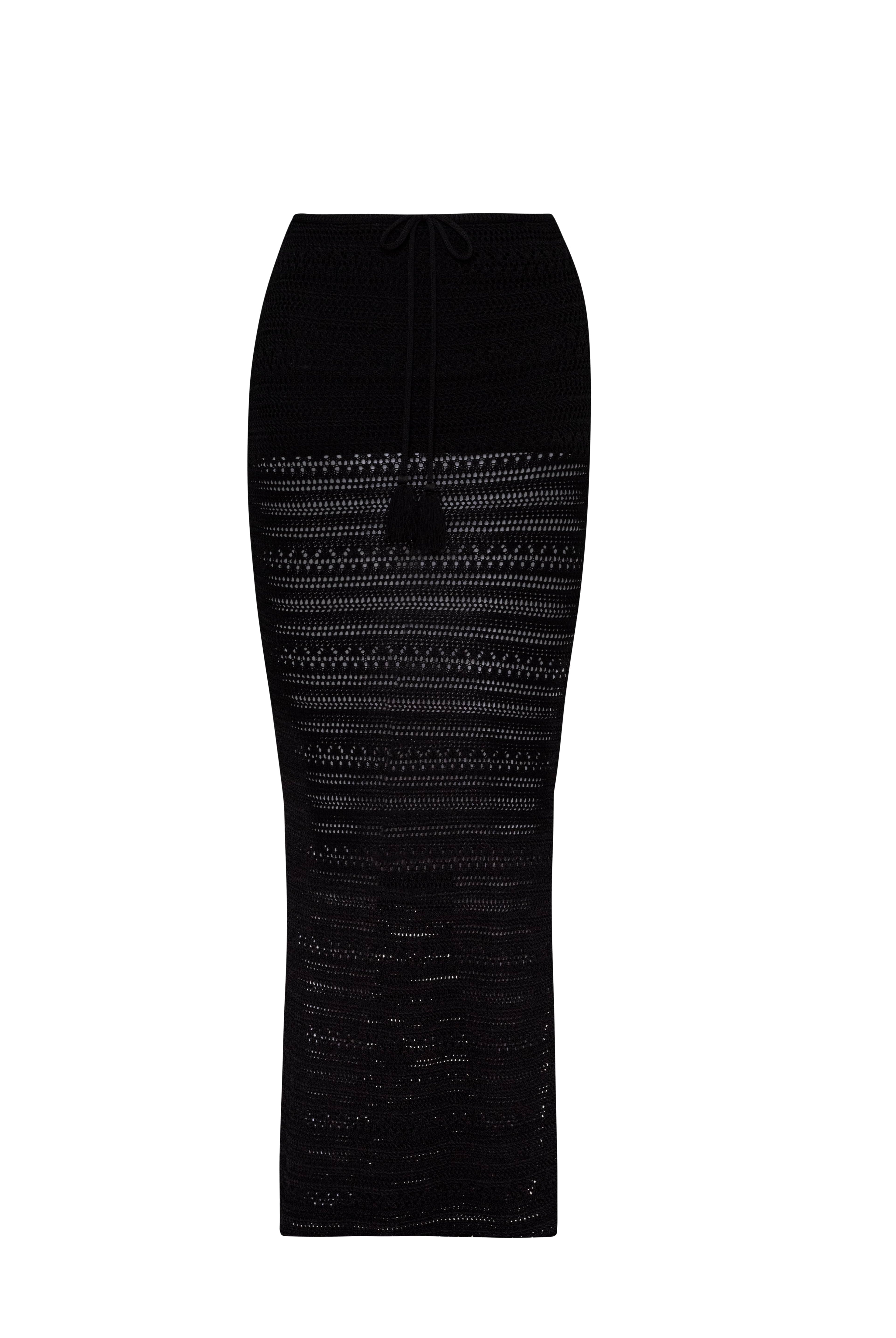 Black knit skirt in front of a white background.