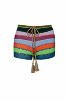 Knit colorful shorts in front of a white background.