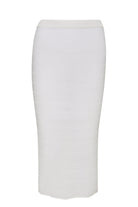 Long, white, knit skirt in front of a white background.