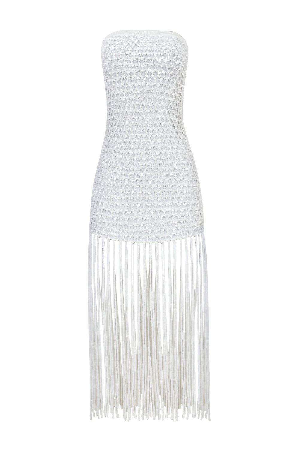 A white strapless fringe hem dress with macramé details. Featured against a white wall background.