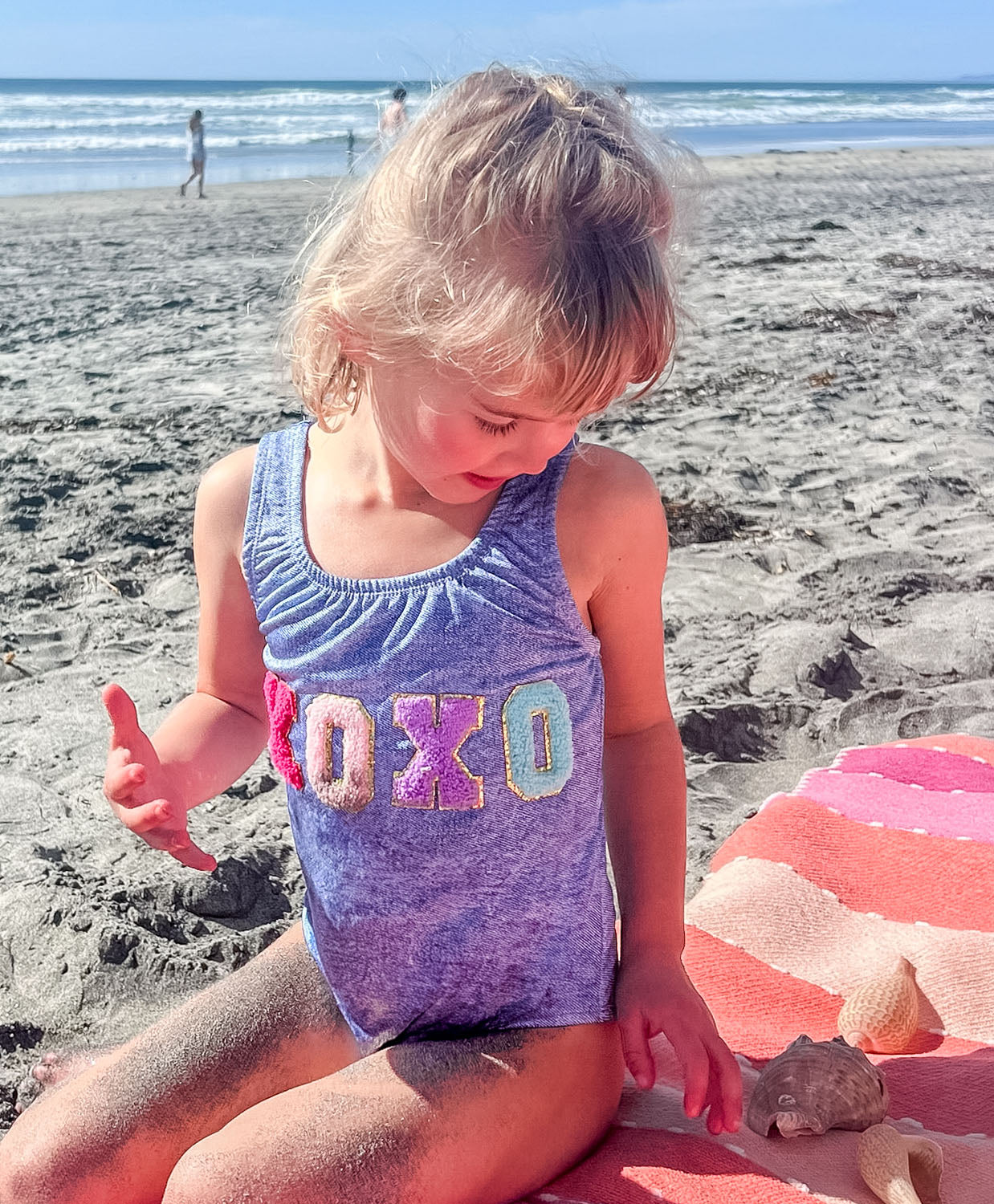 Kids Indie Sky XOXO One Piece swimsuit with subtle poolside sparkle, perfect for a cute getaway look.